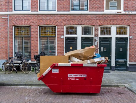 Mattress removal team handling bulky waste collection in a London property