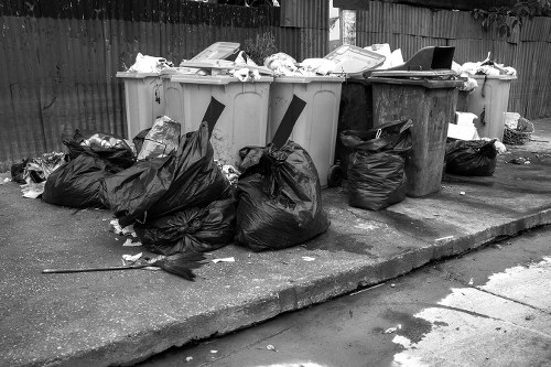 Cleaning litter from a commercial forecourt in London