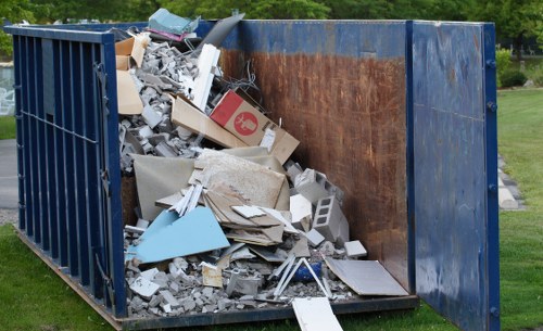 Professional sofa collection service handling a sofa bed in London