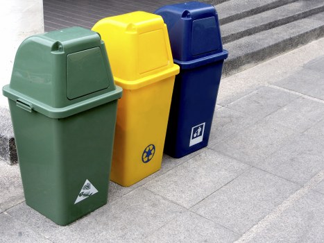 Local waste removal team handling rubbish clearance in a London street