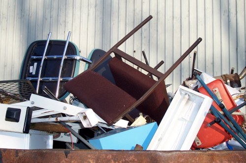 Moving a bulky corner sofa down stairs in a London property