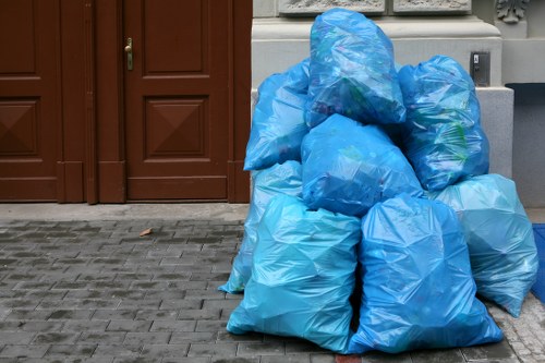 Office furniture and packaging ready for business waste collection
